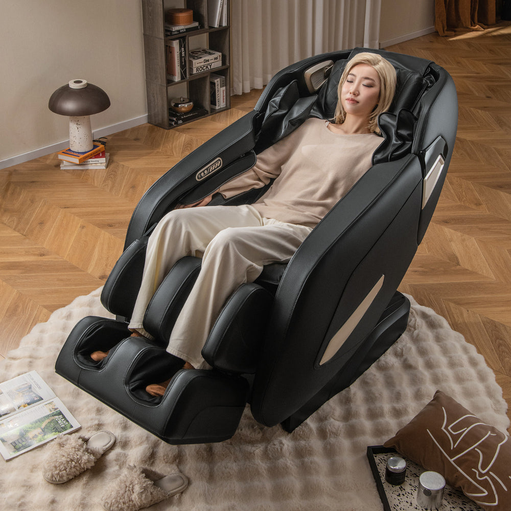 A woman relaxing in a Costway Zero Gravity Shiatsu Massage Chair in a modern living room.