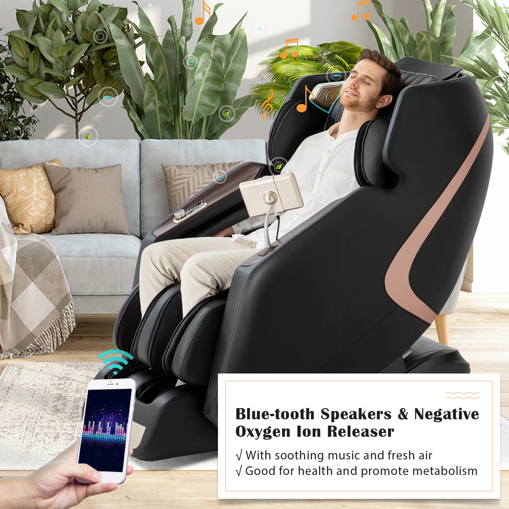 Man relaxing in a Costway Enjoyment 13 3D Full Body Massage Chair with Bluetooth speakers.