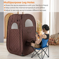 Portable steam sauna with adjustable leg holes, 1000W generator, and foldable chair for home spa relaxation.