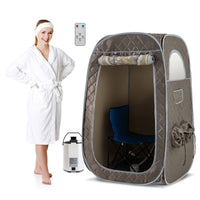 Portable steam sauna in grey with foldable chair, 1000W generator, and adjustable leg holes for home relaxation.